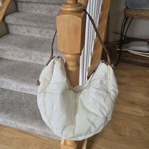 Kate Spade cream puffer shoulder clutch purse